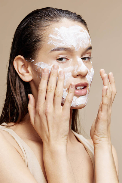 brunette face mask cream clean skin facial scrub close-up - Zdjęcie, obraz