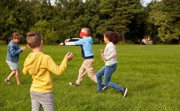 happy children playing and running at park - Photo, Image