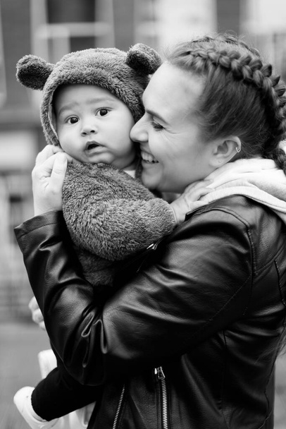 young mother with son on the street  - Fotoğraf, Görsel
