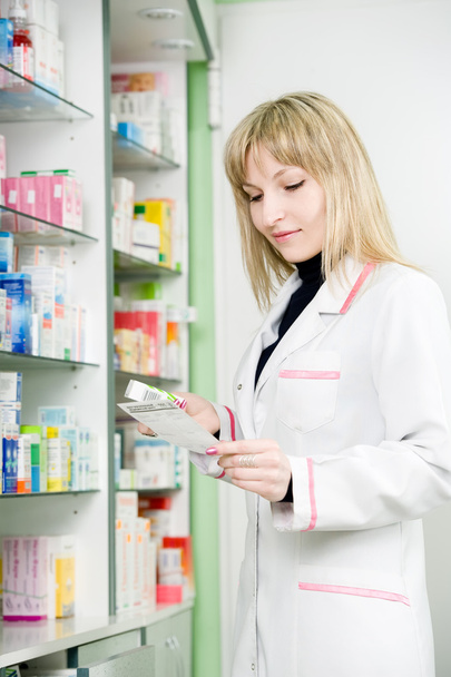Pharmacy chemist woman in drugstore - Zdjęcie, obraz
