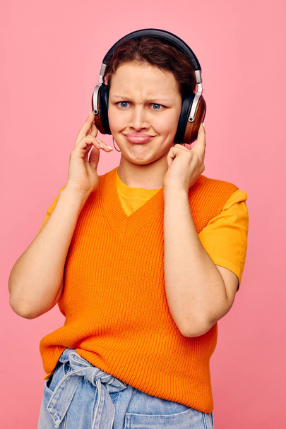 funny girl grimace headphones entertainment emotions music cropped view unaltered - Fotó, kép