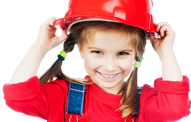 Little girl in red helmet - Foto, imagen