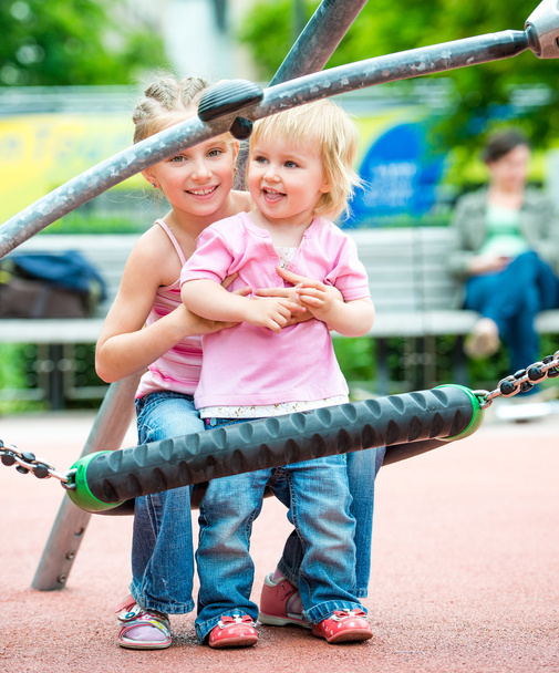 Children at the playground - Foto, Bild