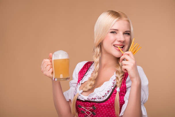 Young sexy blonde wearing dirndl - 写真・画像