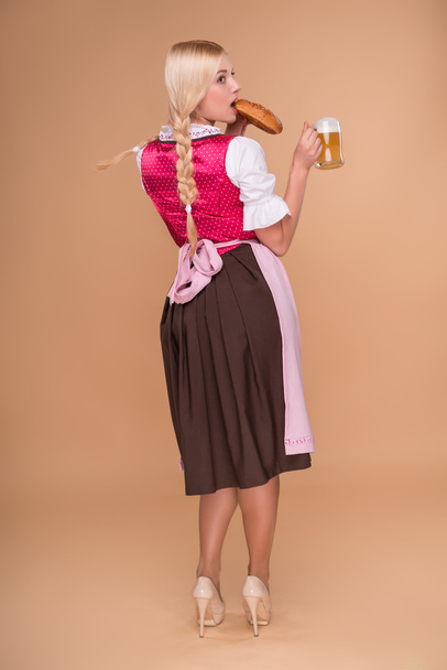 Young sexy blonde wearing dirndl - Foto, afbeelding