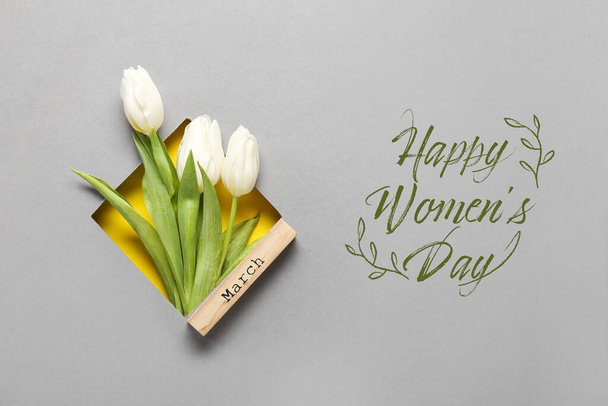 Uluslararası Kadınlar Günü kutlamaları için lale çiçekleriyle güzel bir tebrik kartı. - Fotoğraf, Görsel