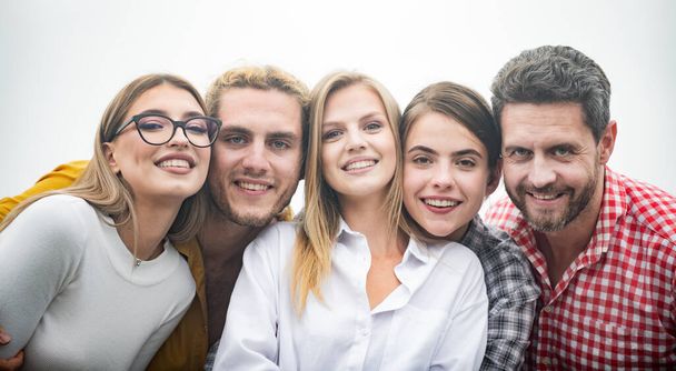Happy company students best friends making selfies. Group young people posing together with smile. - Foto, imagen
