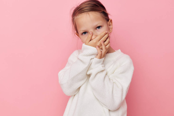 pretty young girl gesture hands emotions grimace isolated background - Foto, afbeelding