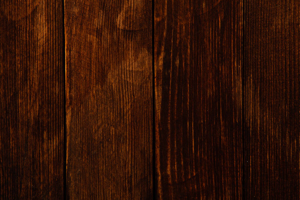 Vintage braunes Holz Hintergrund Textur mit Knoten und Nagellöcher. Alte bemalte Holzwand. Brauner abstrakter Hintergrund. Vintage dunkle horizontale Holzbretter. Frontansicht mit Kopierraum. - Foto, Bild