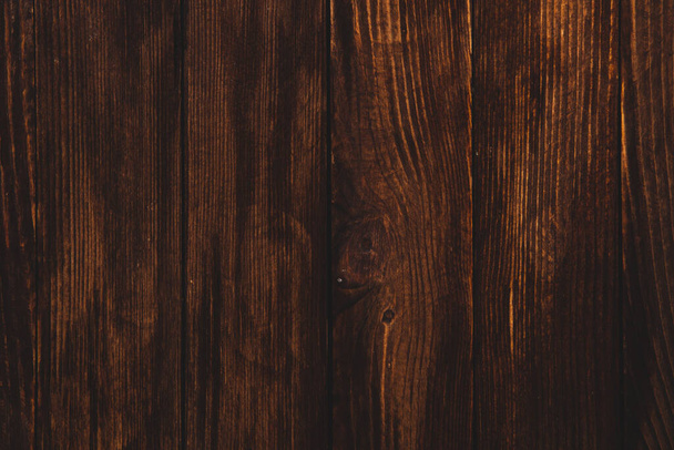 Vintage brown wood background texture with knots and nail holes. Old painted wood wall. Brown abstract background. Vintage wooden dark horizontal boards. Front view with copy space. - Photo, Image