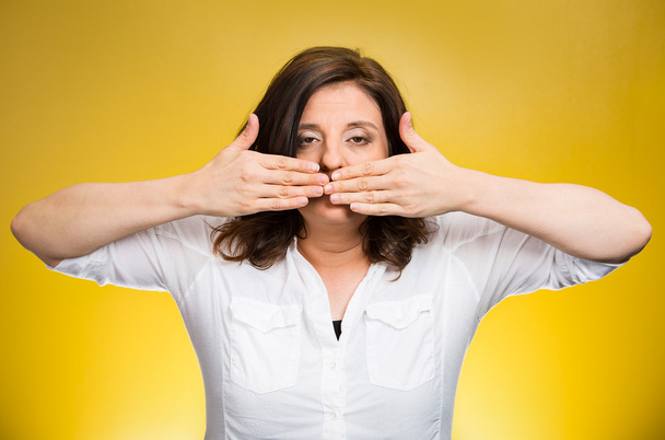 woman covering mouth. Speak no evil - Photo, image