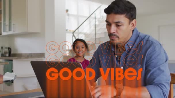 Animation of good vibes text over hispanic father using laptop with daughter. social media and communication interface concept digitally generated video. - Felvétel, videó