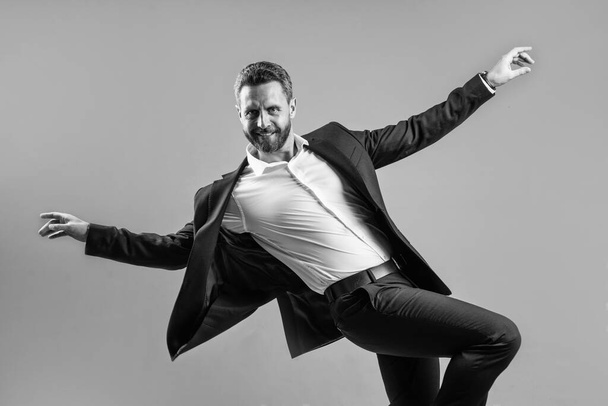 pure happiness. handsome happy ceo. bearded businessman dancing in suit. confidence and success. male formal fashion. celebrate successful business. stylish business man. fashion and beauty - Фото, зображення