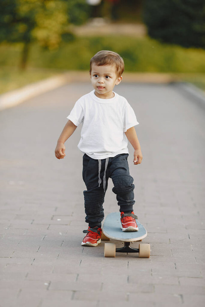 Cute little boy have fun on a playground - Foto, Imagen