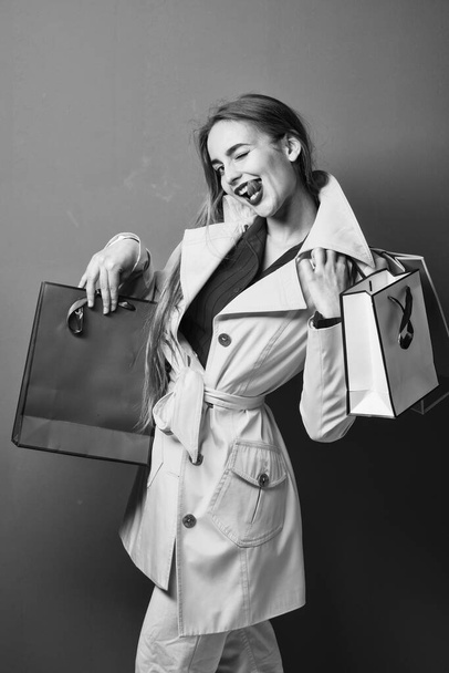 fashionable woman in stylish clothes hold shopping bags, cyber monday - Foto, Imagem