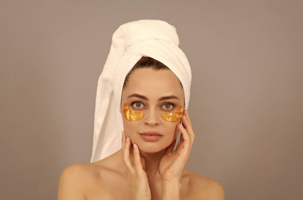 a glowing skin. girl reduce eye bags. skincare. facial collagen cosmetic. moisturizing skin. - Photo, Image