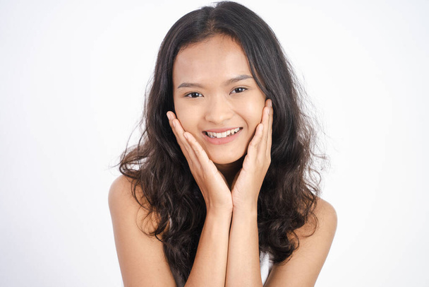 asian woman with clean fresh skin on white background - Fotoğraf, Görsel