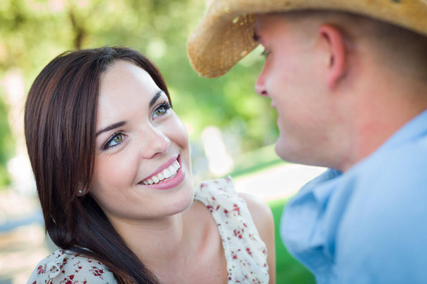 Happy Romantic Caucasian Couple Talking in the Park. - Фото, изображение