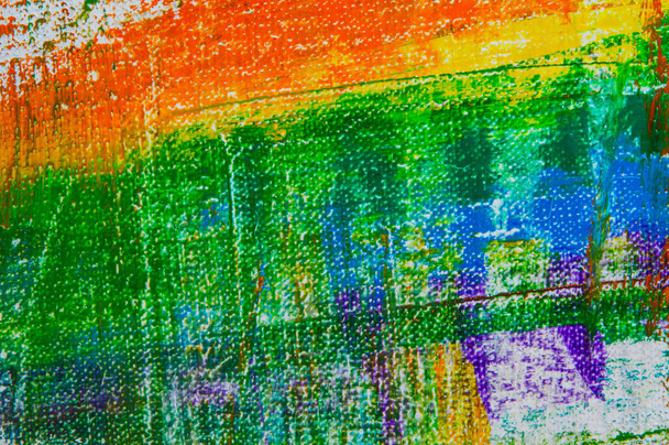 abstract rainbow multicolored background formed by erasing paints from the canvas, short focus. Not an art object, temporary effect.  - Photo, Image