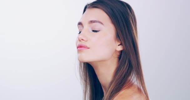 If you are confident, you are beautiful. 4k video footage of a beautiful young woman with gorgeous hair posing in the studio. - Filmmaterial, Video