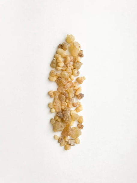 Natural incense, frankincense resin and dammar close-up on a white background, place for text. - Foto, afbeelding