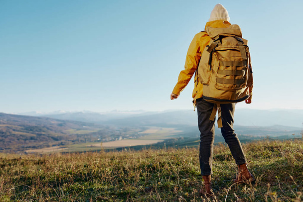 woman tourist backpacking trip to mountains landscape Lifestyle - Zdjęcie, obraz