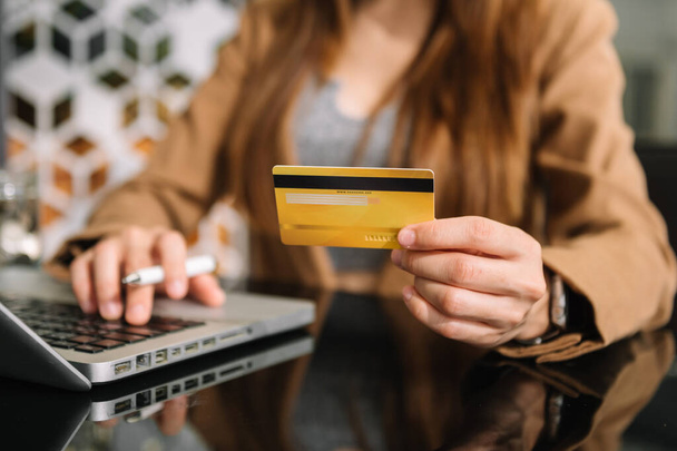 Business woman hands using smartphone and holding credit card with digital layer effect diagram as Online shopping concept - Φωτογραφία, εικόνα