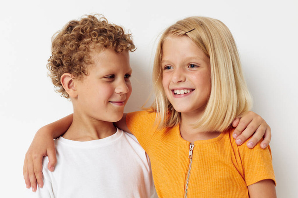 two joyful children Friendship together posing emotions lifestyle unaltered - Foto, Imagen