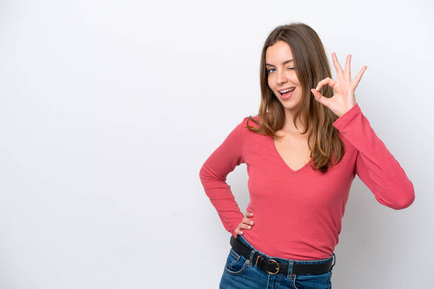 Young caucasian woman isolated on white background showing ok sign with fingers - Foto, Imagem