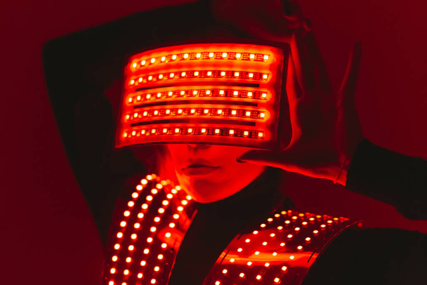 Disco dancer moves in UV ultraviolet suit - Zdjęcie, obraz
