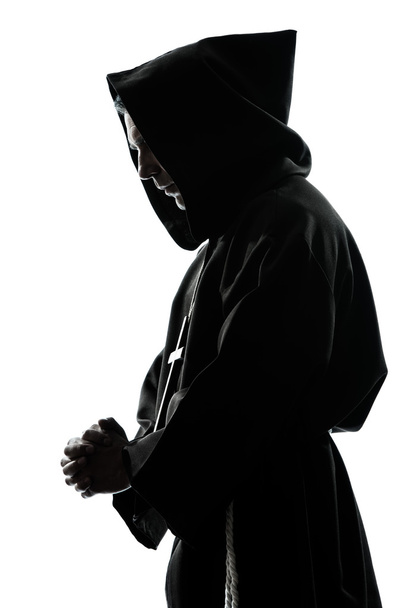 άνθρωπος ιερέας μοναχός προσεύχεται σιλουέτα - Φωτογραφία, εικόνα