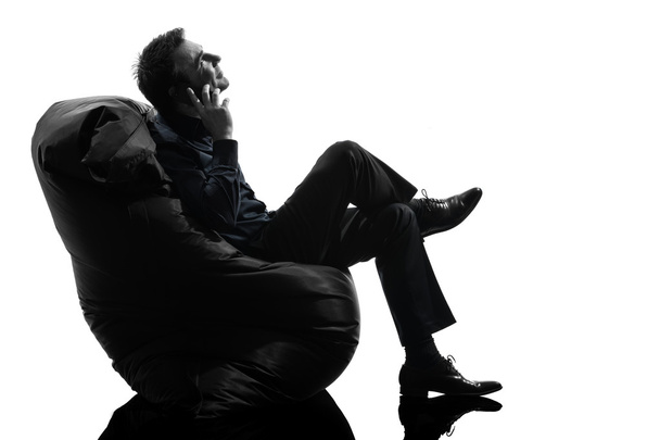 man sitting on the telephone silhouette - Zdjęcie, obraz