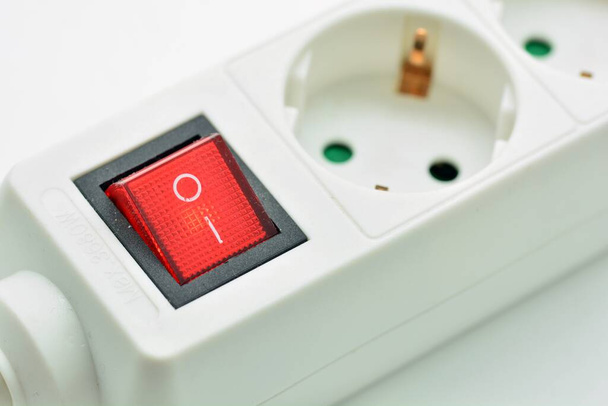 Interruptor de faixa de energia ligado, isolado no fundo branco - Foto, Imagem