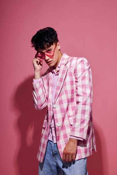 Photo of romantic young boyfriend pink shirt and glasses jacket fashion elegant style model studio - Fotografie, Obrázek