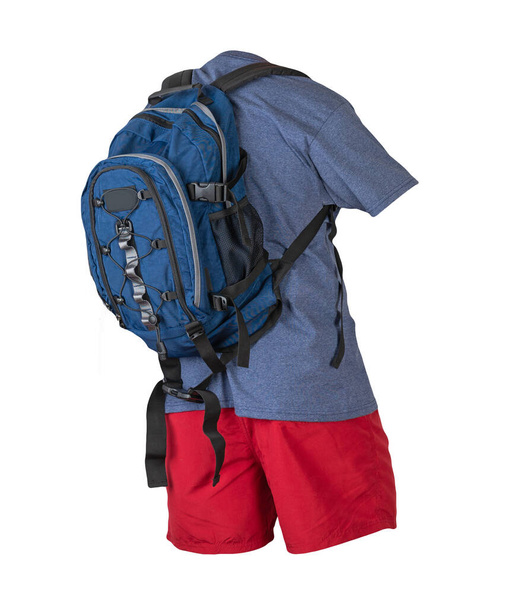 denim blue backpack,red sports shorts,blue t-shirt isolated on white foane. clothes for every day - Foto, afbeelding
