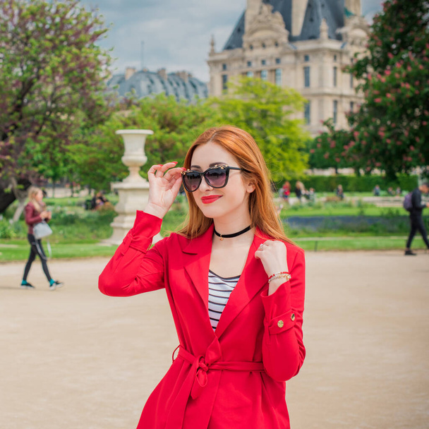 Holidays in Paris, France. Fashionable pretty woman rest in centre of city, concept of vacation. Lady in casual style at street - Photo, Image