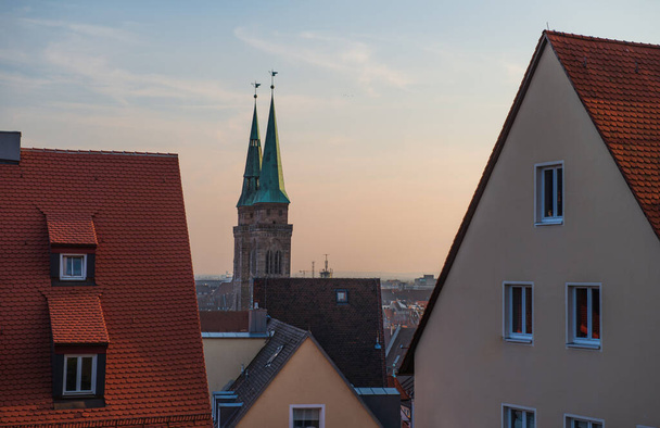 Top cityscape view from the castle hill on the old town with cathedral in Nurnberg during the morning, Germany - Fotó, kép