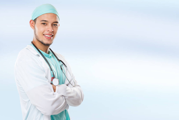 Young doctor portrait side view copyspace copy space occupation latin man job doctor's overall male - Foto, immagini
