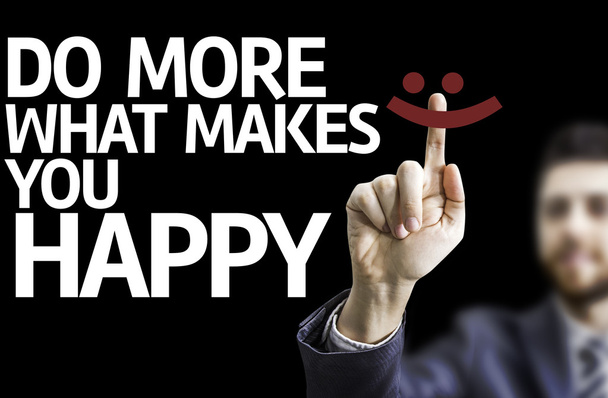 Hombre de negocios señalando el texto: Haz más de lo que te hace feliz
 - Foto, Imagen