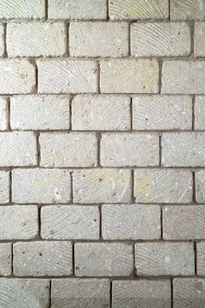 wall built of stone blocks of tuff - Photo, Image