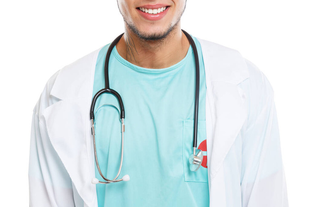 Young doctor smiling happy upper body occupation job isolated on a white background - Foto, Imagen