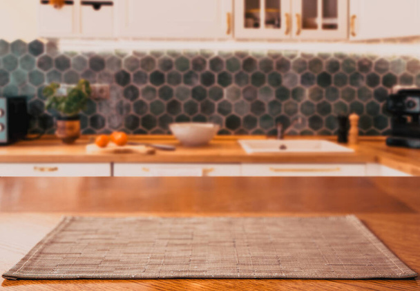 blurred kitchen interior and wooden desk space home background - Zdjęcie, obraz