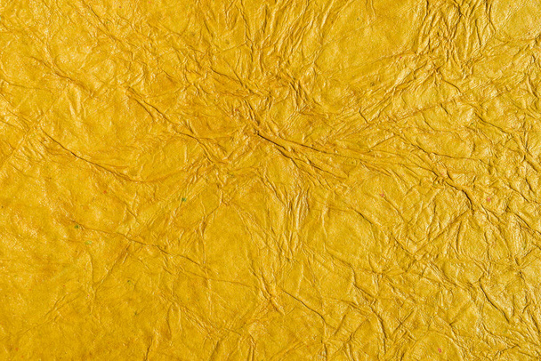 Žluté texturované pozadí grafu. Odstíny růžové v zmačkaném starodávném vinobraní. - Fotografie, Obrázek