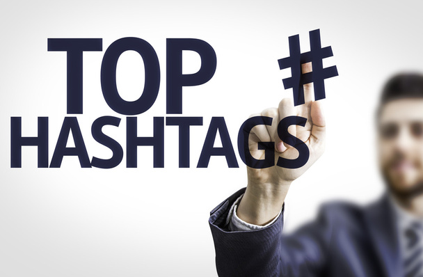 Uomo d'affari che indica il testo: Top Hashtags
 - Foto, immagini