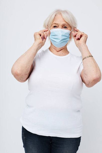 elderly woman health lifestyle medical mask treatment close-up - Fotó, kép