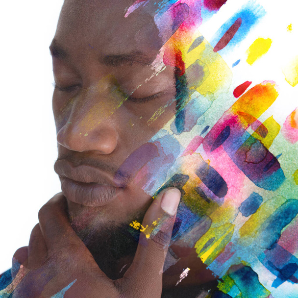 Paintography. A portrait of a man combined with colorful watercolor splashes. - 写真・画像