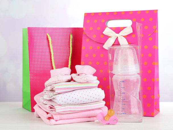 Baby clothes and gift bags - Photo, Image