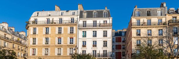 Paris, typical facade, beautiful building, with old zinc roofs rue Saint-Ambroise - Photo, Image