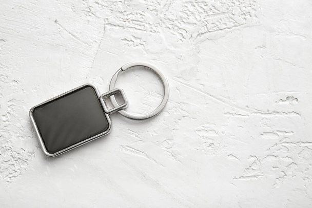 Stylish square keychain on white background - Photo, Image
