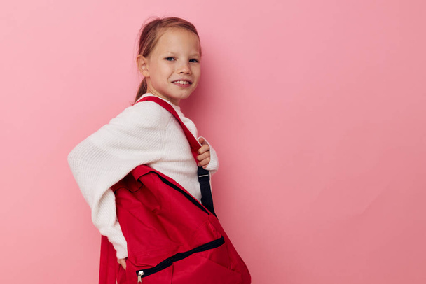 Portrait of happy smiling child girl kids style backpack school isolated background - Zdjęcie, obraz